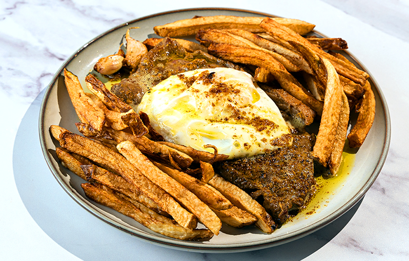 Bitoque (Steak, eggs, rice, potatoes)